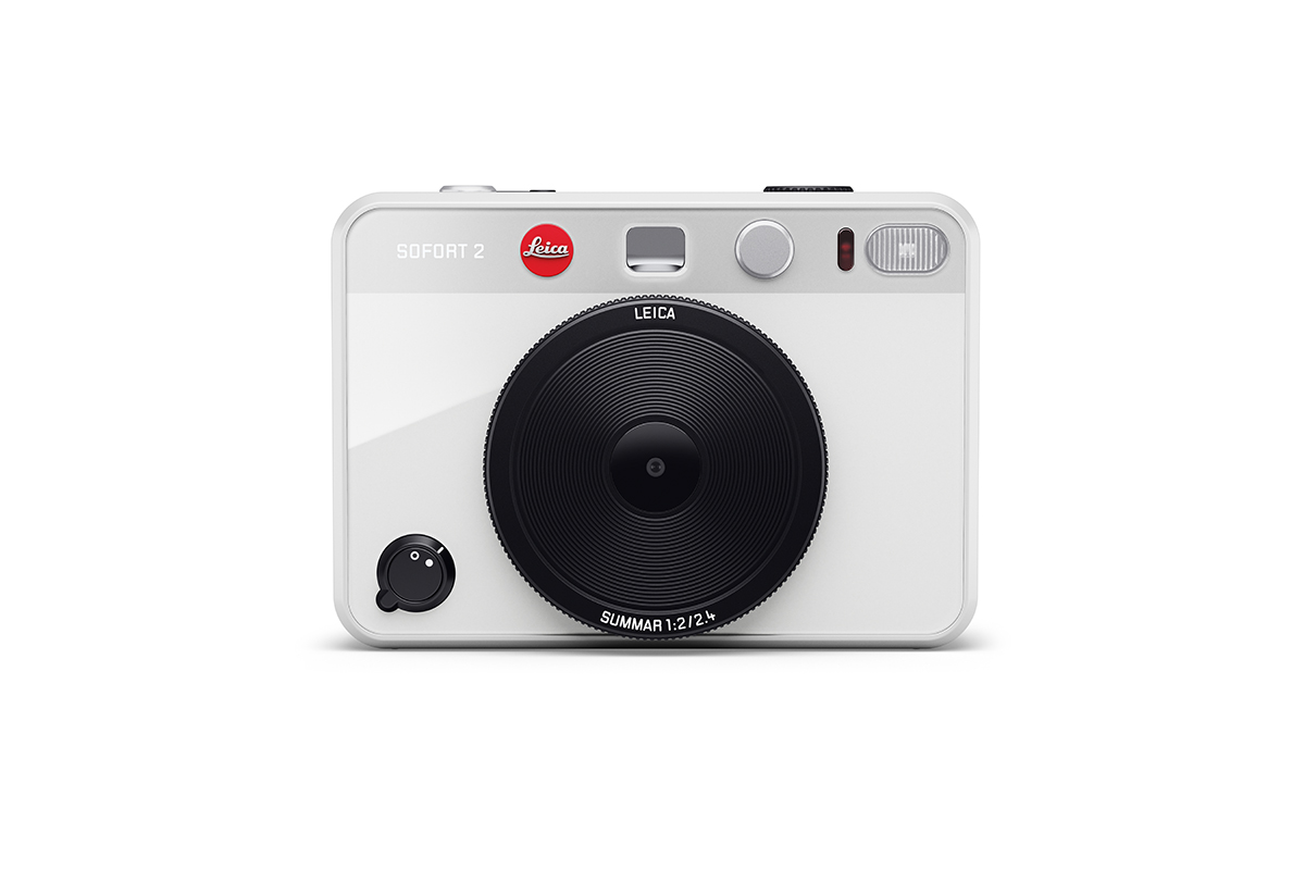 Leica white SOFORT 2 instant camera sporting a sleek and minimalist package combines digital and analog functions with selfie, landscape, and macro modes. 