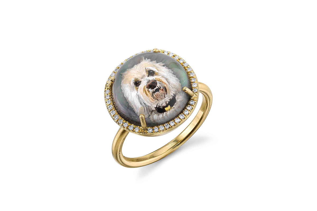 Fine jeweler Irene Neuwirth's One of a Kind Custom Pet Portrait ring in gold featuring a dog painting in a round shape surrounded by diamonds.